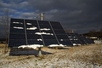 image: Photovoltaic panels track and rotate along the path of the sun in Hinesburg, Vt., Dec. 24, 2012.
