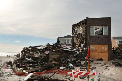 image: A destroyed home sets along the beach in the Belle Harbor neighborhood in the Rockaways in Queens, N.Y., Jan. 2, 2013.