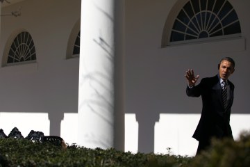 President Barack Obama walks down the colonnade at the White House
