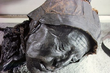 The Tollund Man hanged with a leather cord and cast into a Danish bog 2,300 years ago.