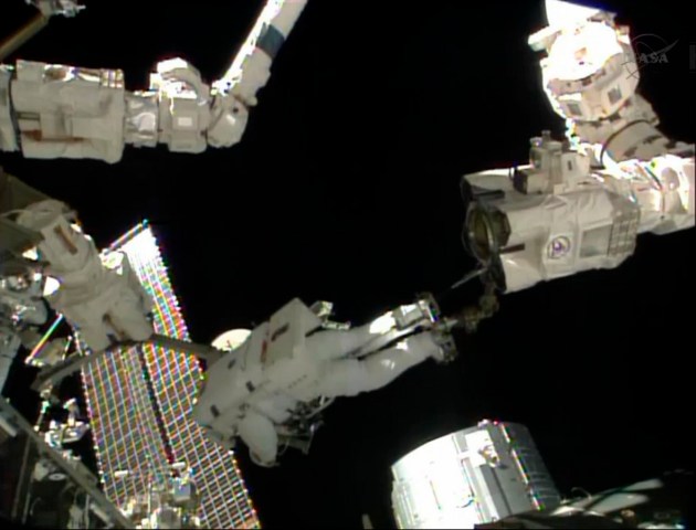 Canadian Space Agency image of flight engineers Parmitano and Cassidy working during Expedition 36 spacewalk