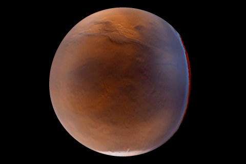Global view of Mars showing Valles Marineris and the south pole.