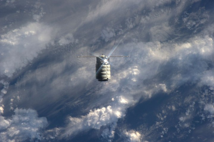 The unmanned U.S. commercial cargo ship Cygnus is seen approaching the International Space Station on Sept. 29, 2013. Cygnus flew itself to the International Space Station, completing the primary goal of its debut test flight before supply runs begin in December.