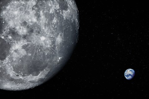 Moon with star field and Earth