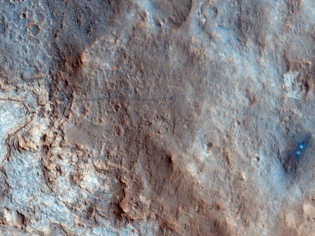 The first color image of Curiosity's rover tracks in color, released on Jan. 30, 2013. 