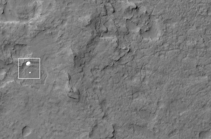 NASA's Curiosity rover and its parachute were spotted by NASA's Mars Reconnaissance Orbiter as Curiosity descended to the surface, on Aug. 6, 2012.